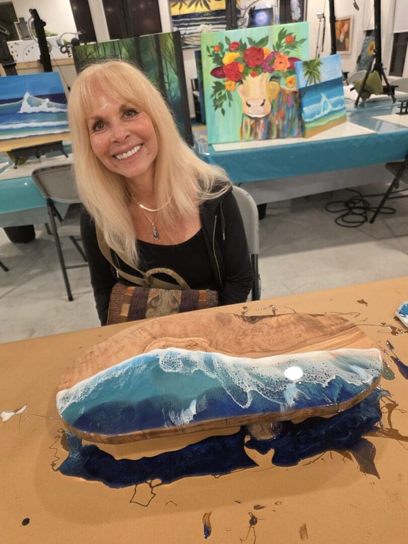 Create a beach-inspired resin charcuterie board in this guided, hands-on art class. Ocean colors, wave techniques, and unique board styles.