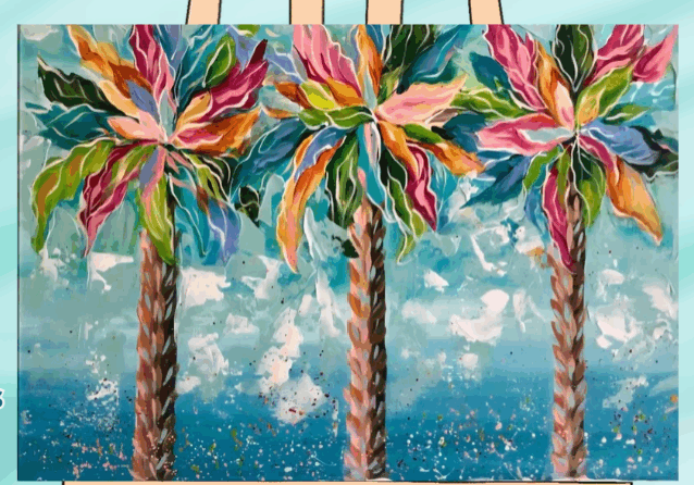 Colorful palm trees painting on an easel.